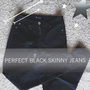 Black stretchy mid-rise skinny jeans